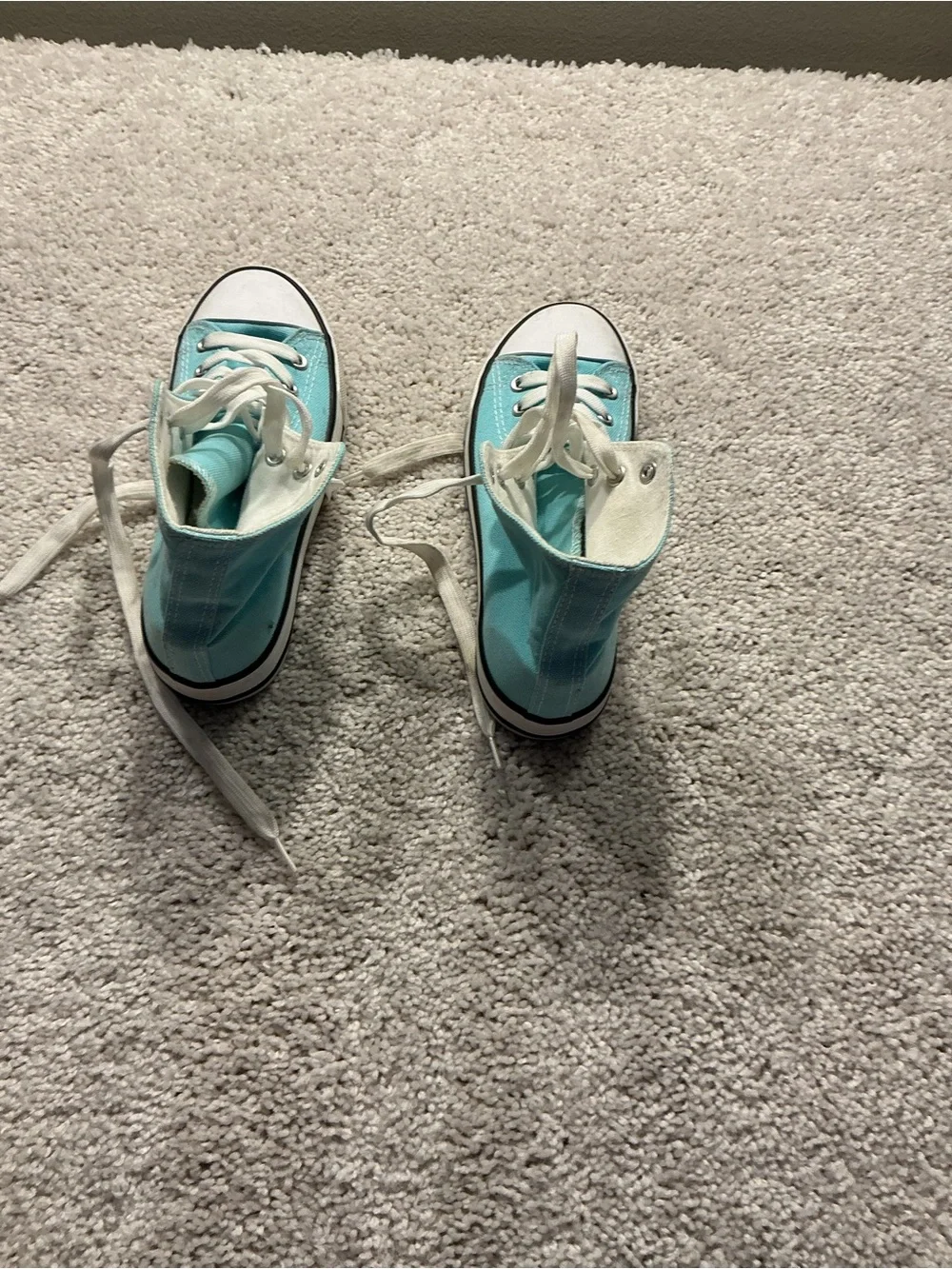 Source Unknown bright teal